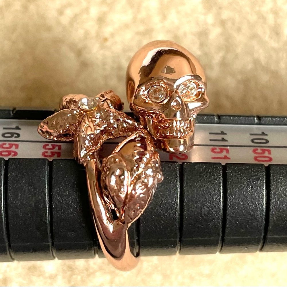 Alexander McQueen rose gold adjustable skull ring
